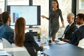 westbury shot-of-a-corporate-businessperson-giving-a-presentation 2